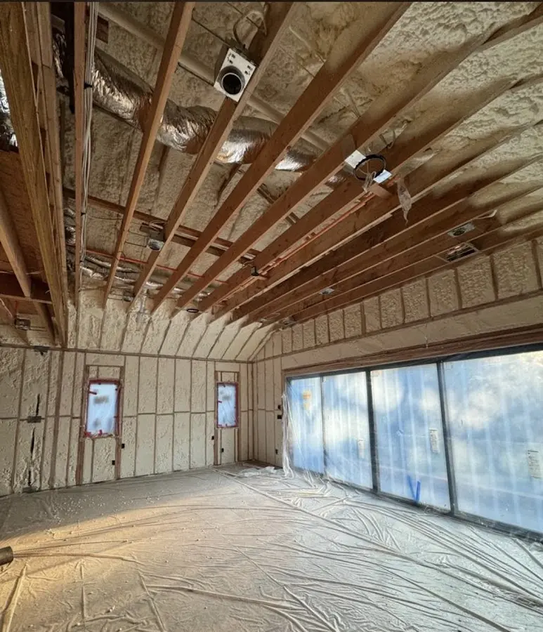 Interior walls and ceiling insulated with spray foam during new construction in Waco